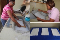 Mujeres de barrios de Herrera en Santo Domingo Oeste, procesan el papel en pulpa para volver a utilizarlo como materia prima de alta calidad.
