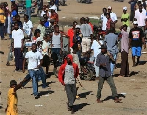 Haitianos tirotean patrulla municipal